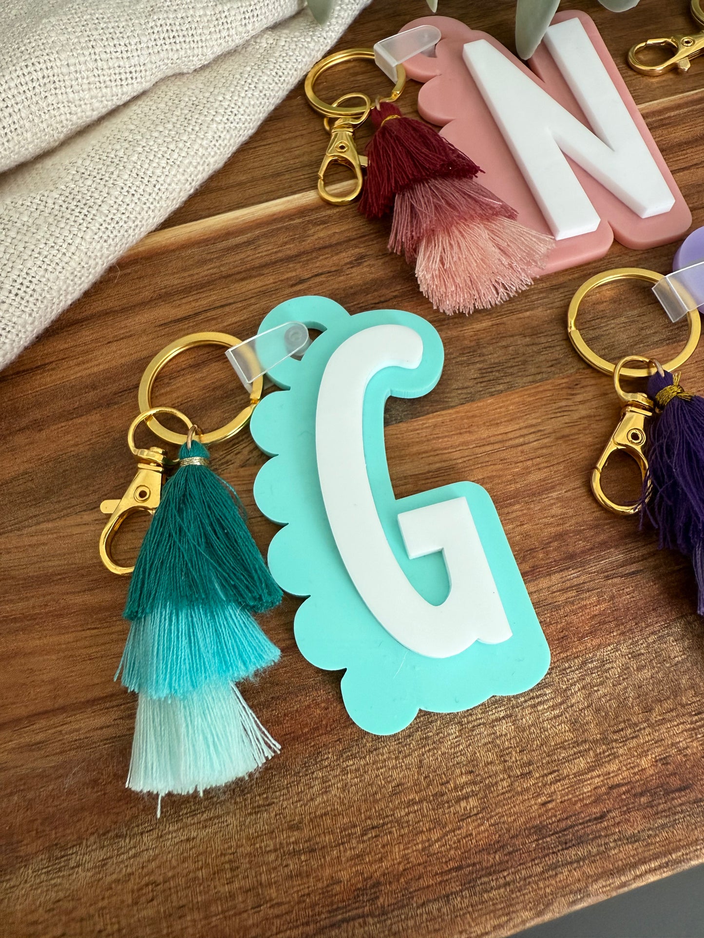 Initial Scalloped Tag with Tassel Keyring